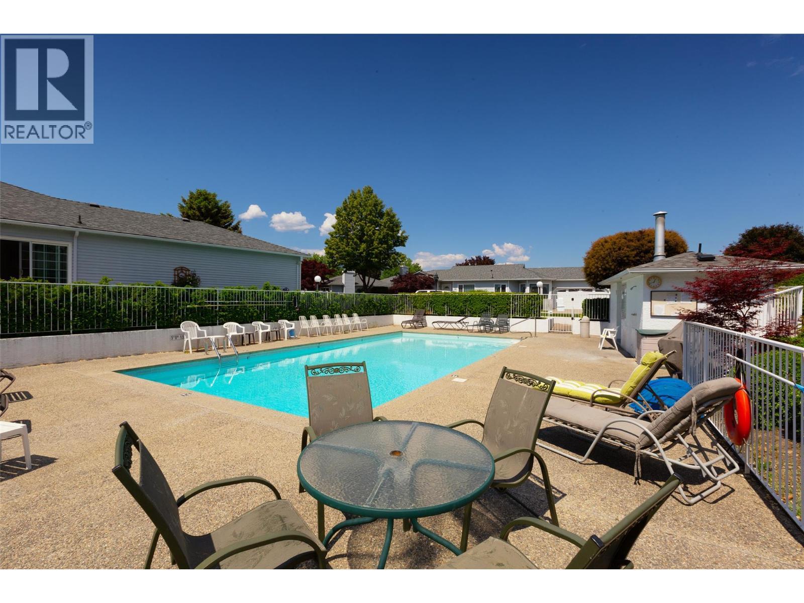 1101 Cameron Avenue Unit# 60, Kelowna, BC - Outdoor With In Ground Pool With Deck Patio Veranda With Backyard