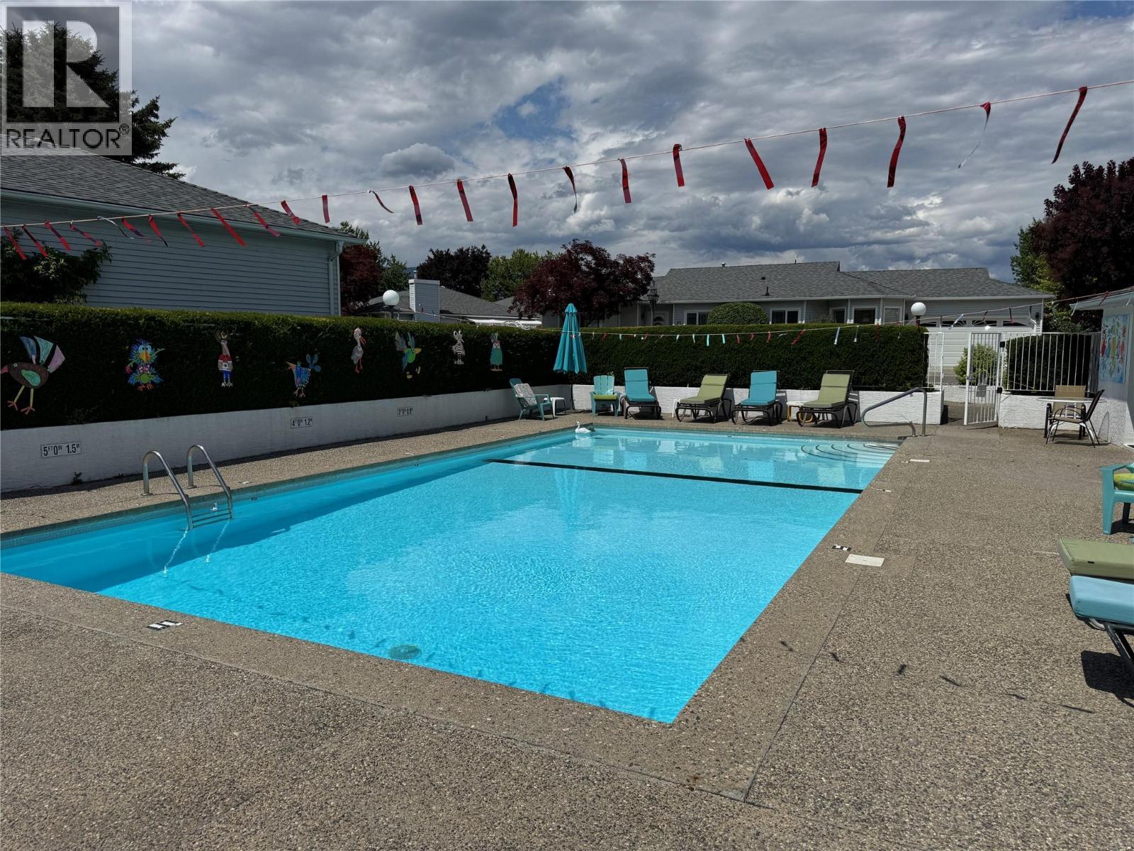 1101 Cameron Avenue Unit# 60, Kelowna, BC - Outdoor With In Ground Pool