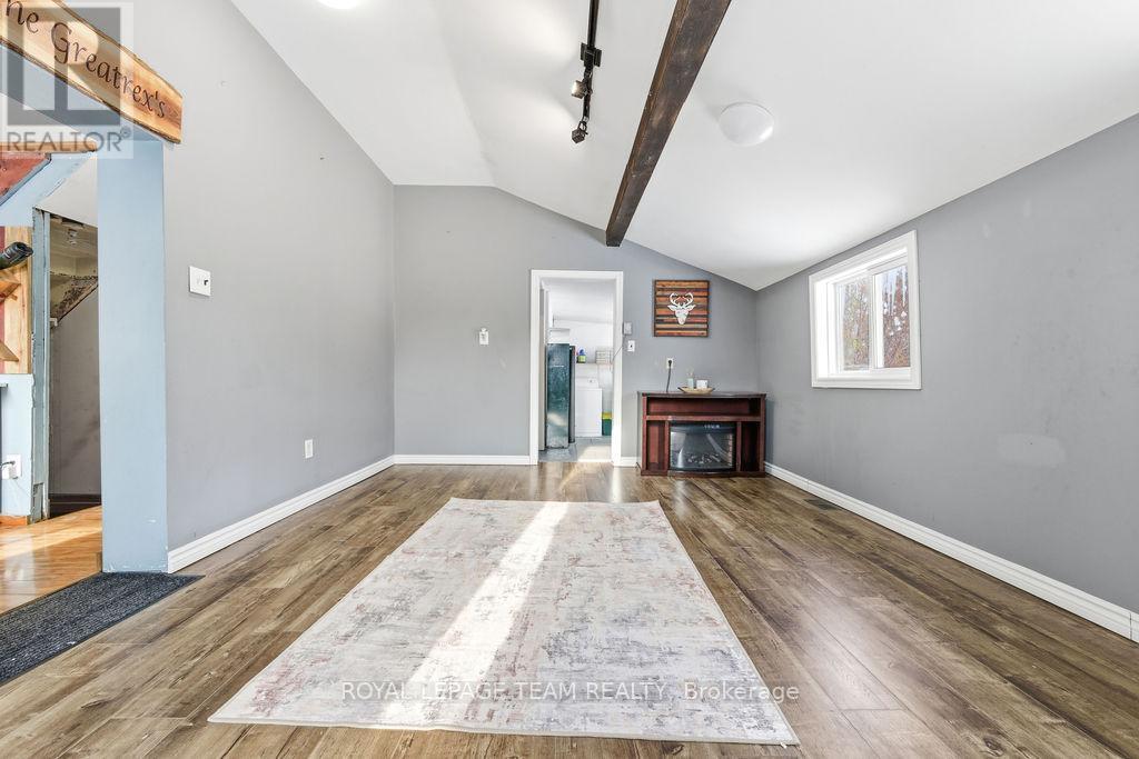 Laundry and bathroom through door - 160 Burnstown Road, Mcnab/Braeside, ON - Indoor With Fireplace