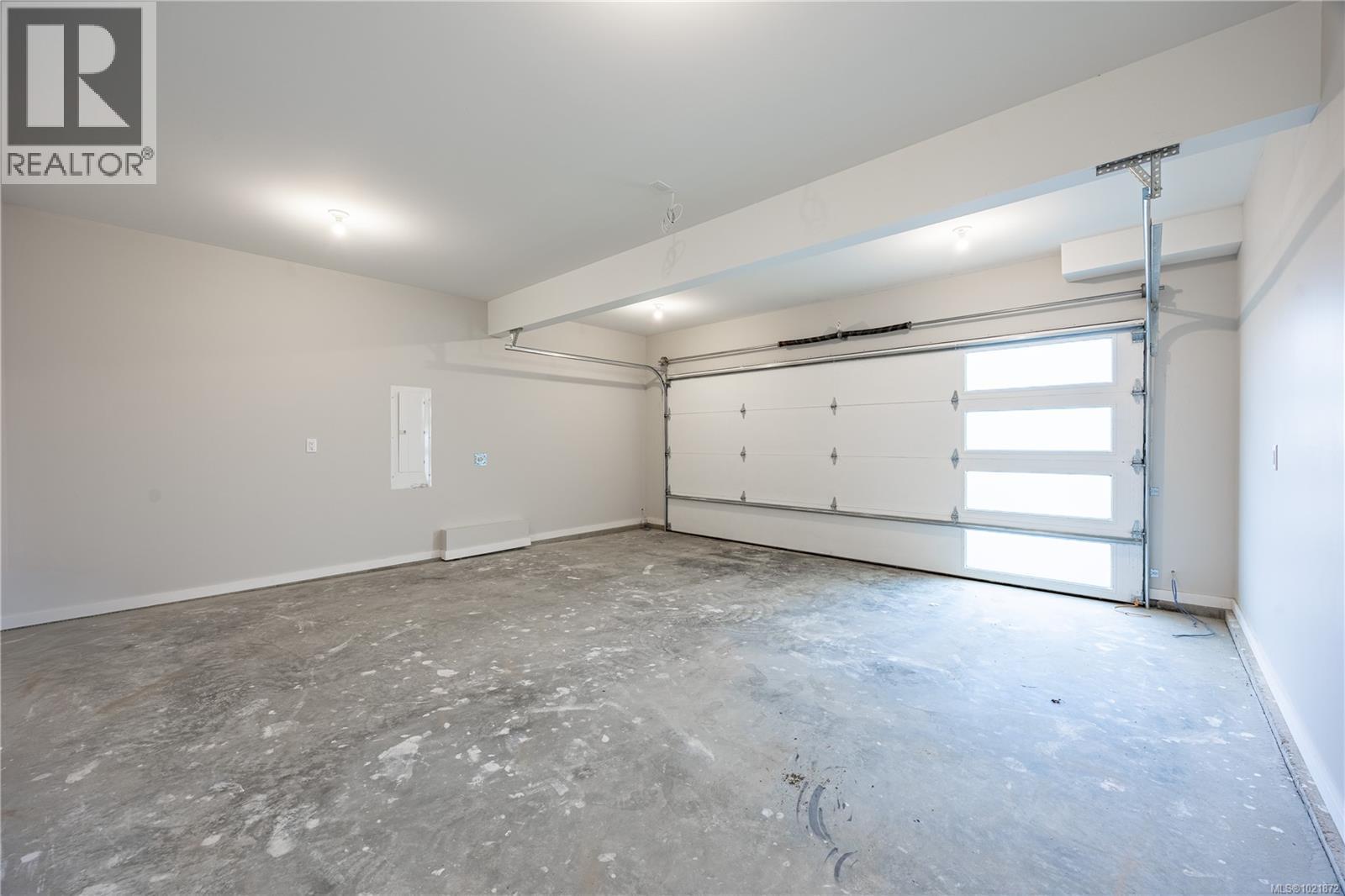 Similar Home - 151 Marina View Dr, Ladysmith, BC - Indoor Photo Showing Garage