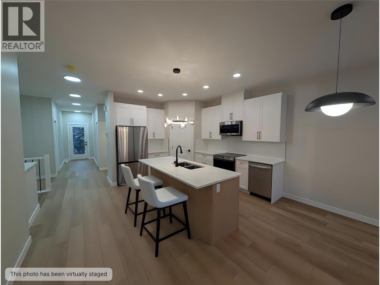 7114 Morgan Lane, Radium Hot Springs, BC - Indoor Photo Showing Kitchen With Stainless Steel Kitchen With Double Sink