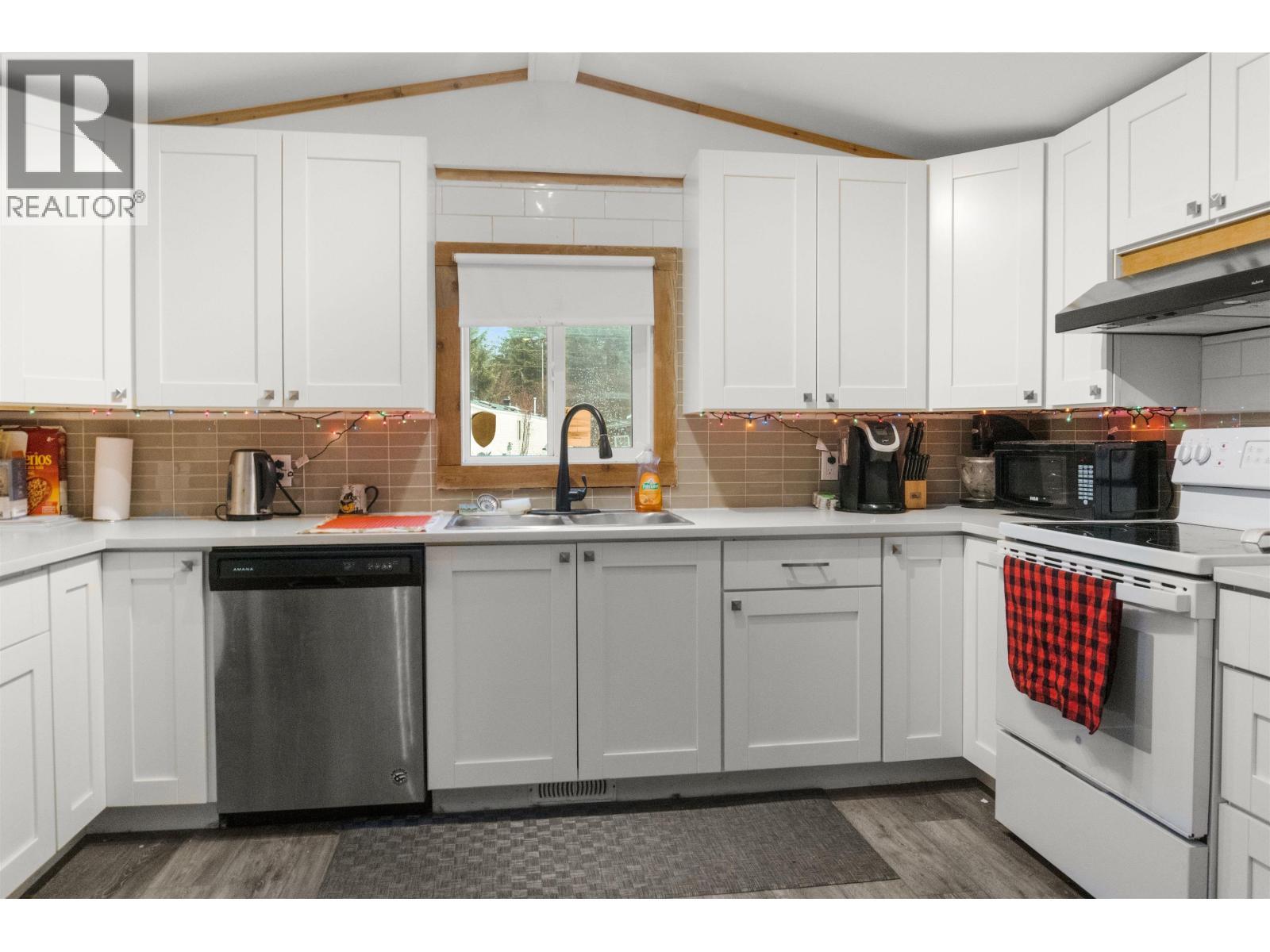 48 584 Columbia Avenue, Kitimat, BC - Indoor Photo Showing Kitchen With Double Sink