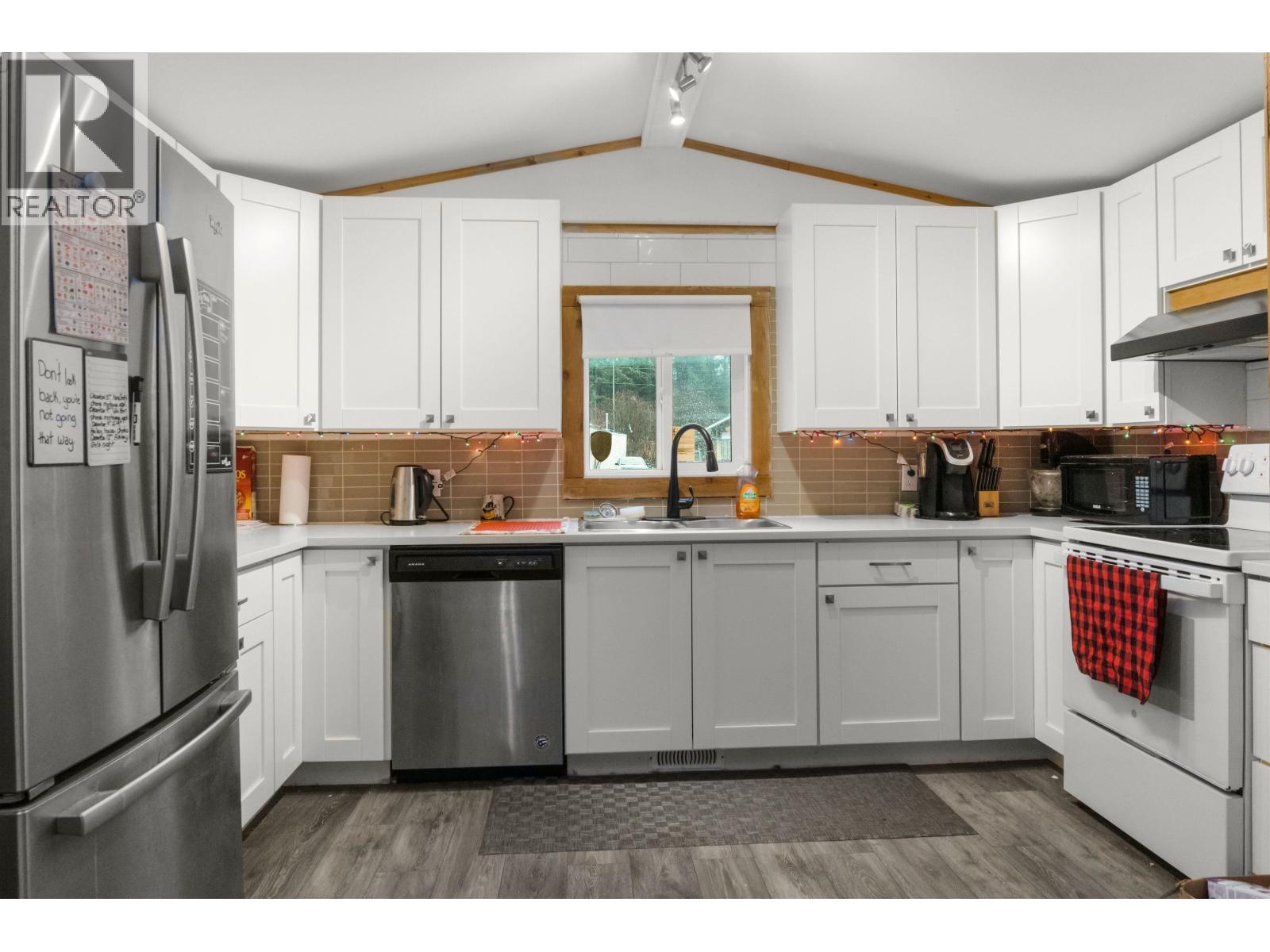 48 584 Columbia Avenue, Kitimat, BC - Indoor Photo Showing Kitchen With Double Sink