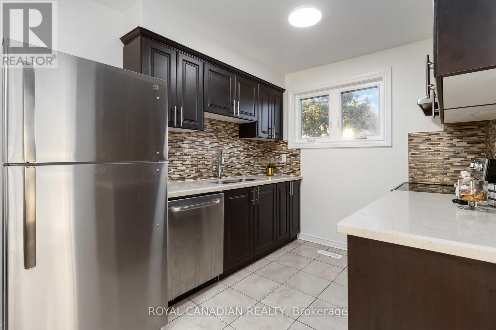 106 - 475 Bramalea Road, Brampton, ON - Indoor Photo Showing Kitchen With Double Sink