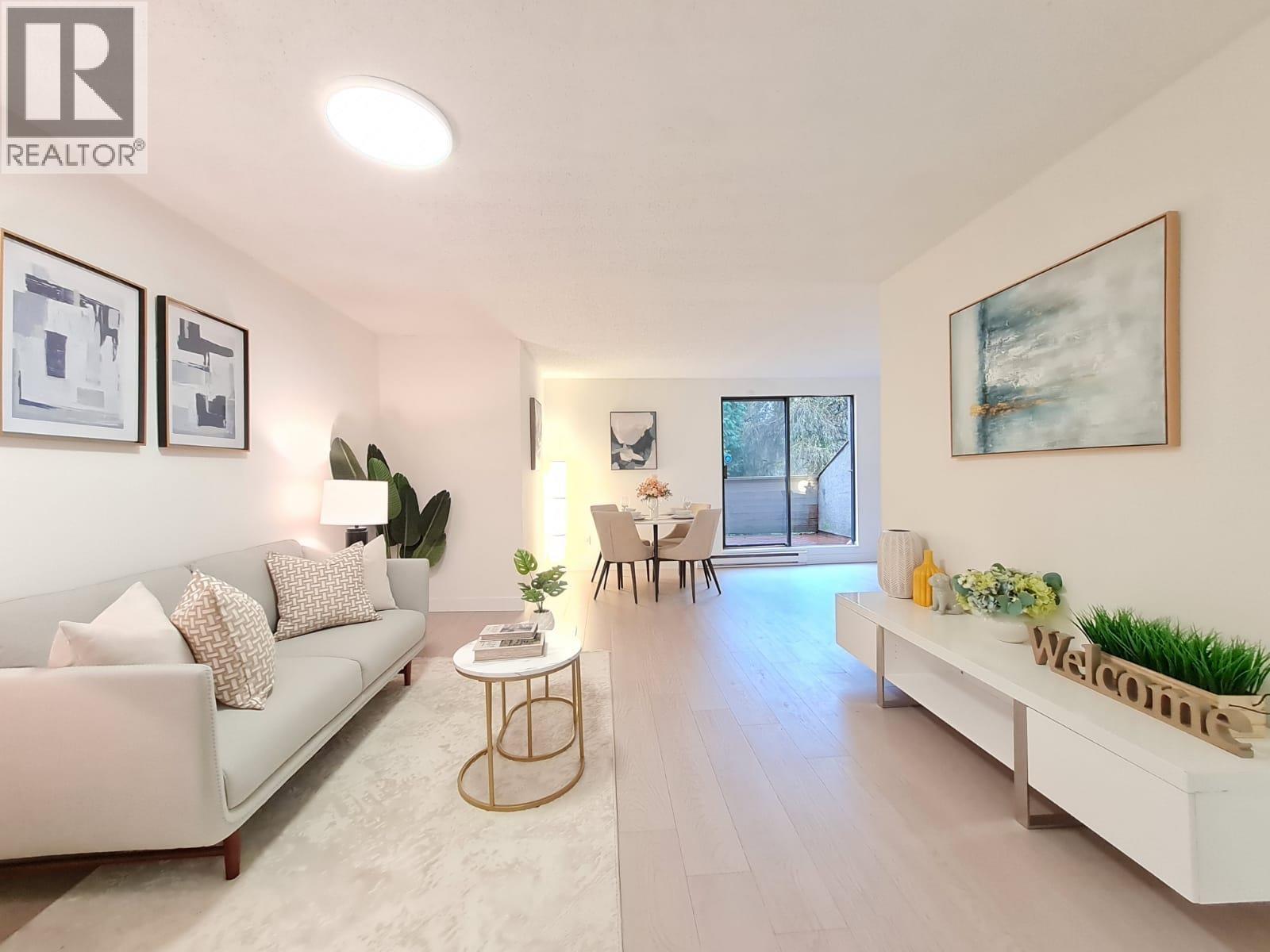 202 9128 Capella Drive, Burnaby, BC - Indoor Photo Showing Living Room