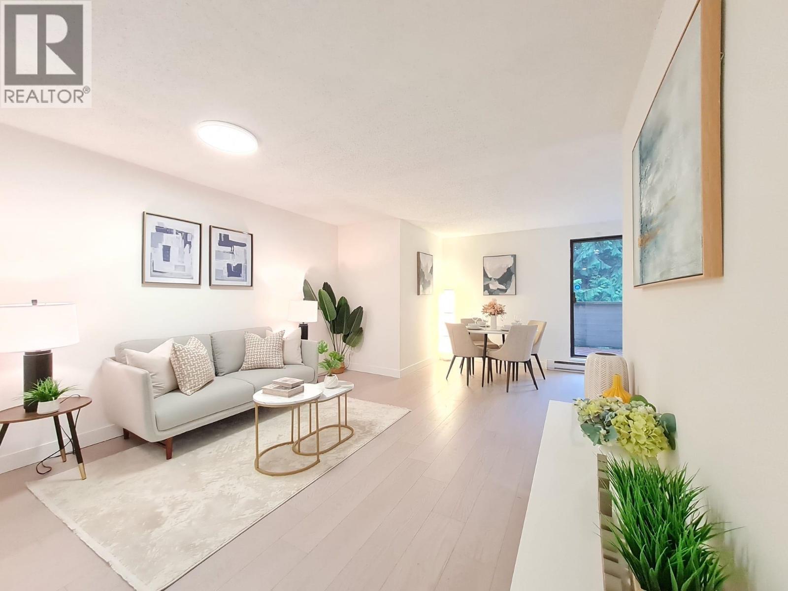 202 9128 Capella Drive, Burnaby, BC - Indoor Photo Showing Living Room