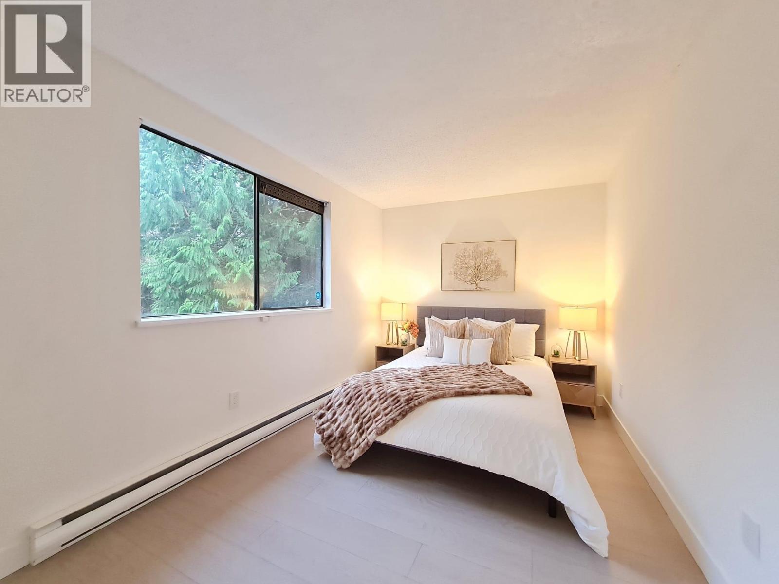 202 9128 Capella Drive, Burnaby, BC - Indoor Photo Showing Bedroom