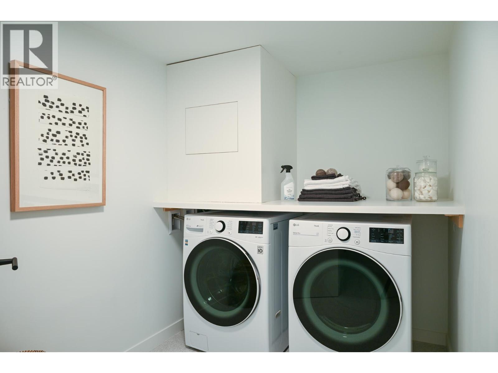 210 2045 Heritage Park Lane, North Vancouver, BC - Indoor Photo Showing Laundry Room