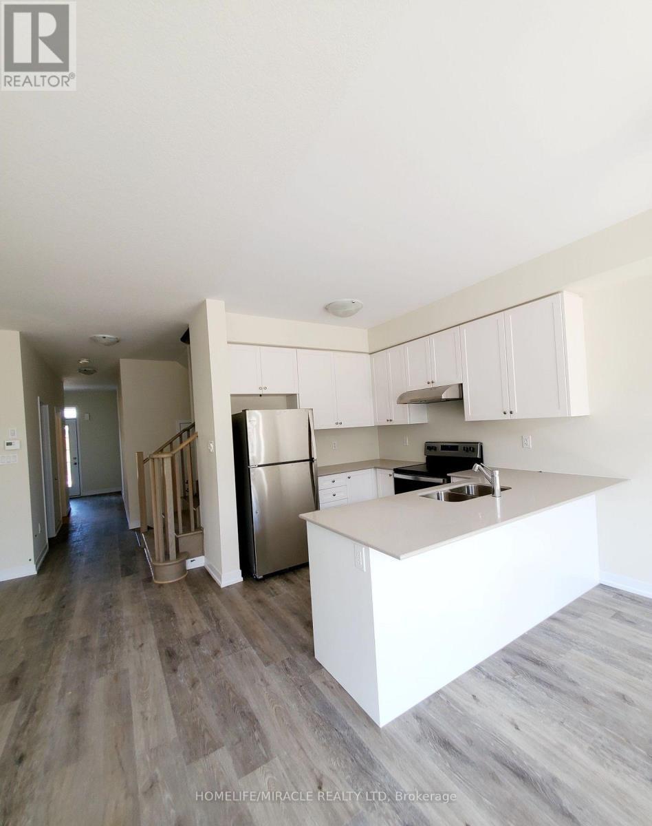 2 - 7789 Kalar Road, Niagara Falls, ON - Indoor Photo Showing Kitchen With Stainless Steel Kitchen With Double Sink