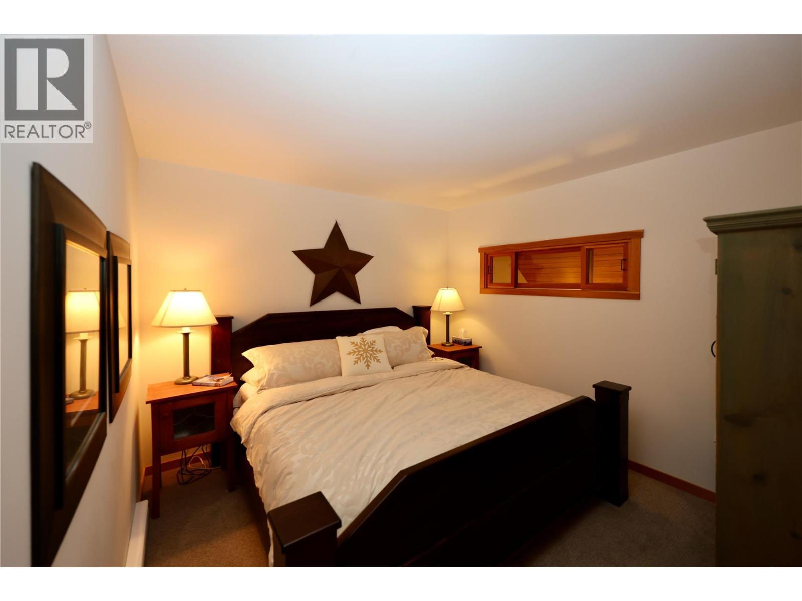 1336 Palliser Trail Unit# 9, Golden, BC - Indoor Photo Showing Bedroom