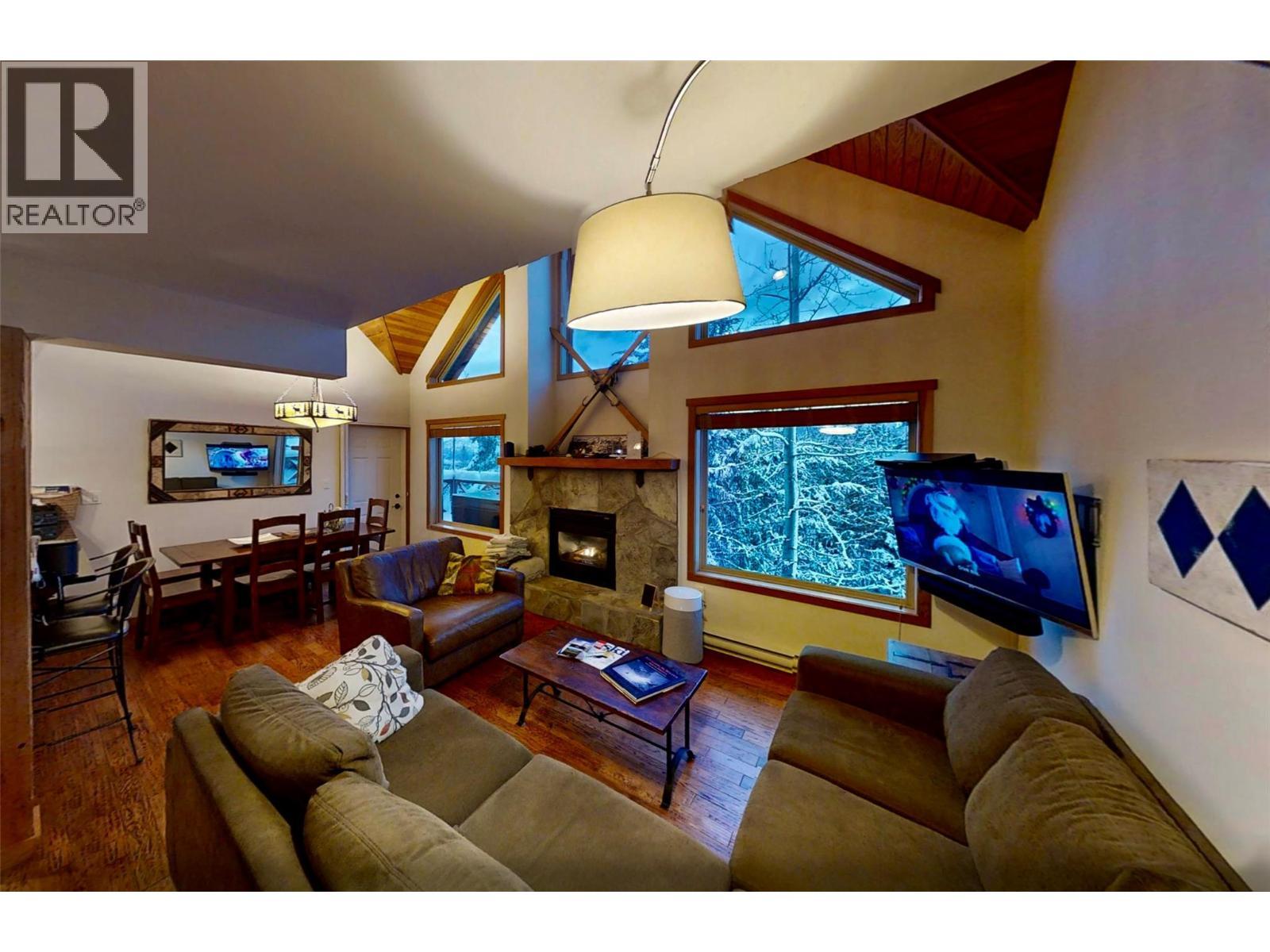 1336 Palliser Trail Unit# 9, Golden, BC - Indoor Photo Showing Living Room With Fireplace