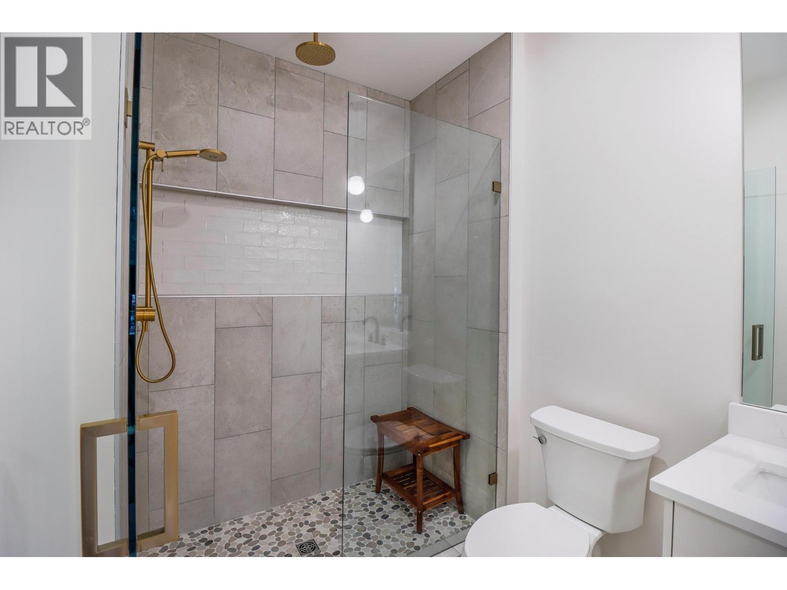 Main floor laundry and storage - 128 Shadow Mountain Boulevard, Cranbrook, BC - Indoor Photo Showing Other Room