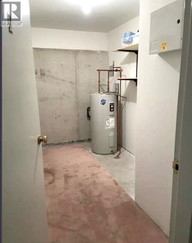 Storage Room - 573 10Th Avenue Unit# 2, Castlegar, BC - Indoor Photo Showing Basement