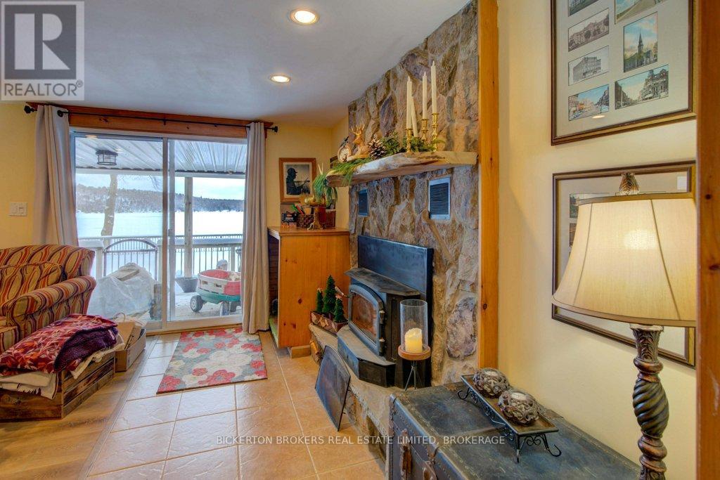 4 Lakeview Drive, Westport, ON - Indoor With Fireplace