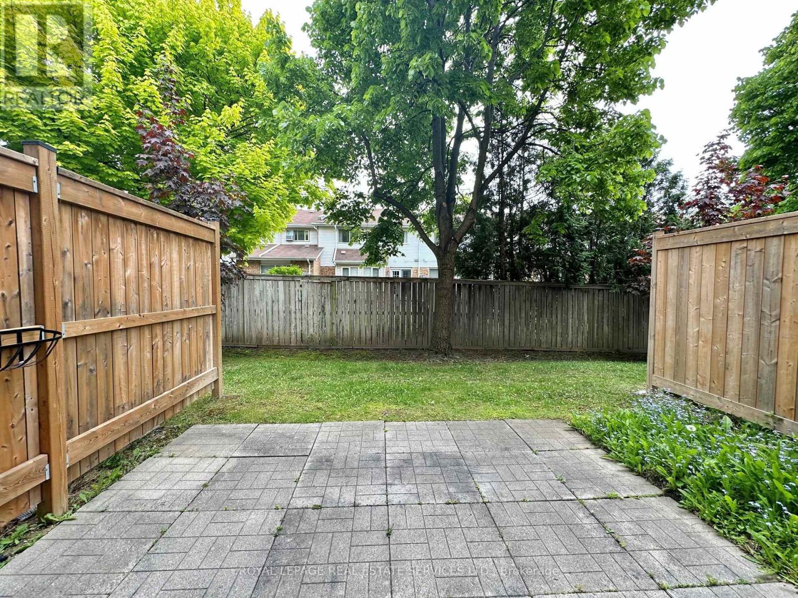39 - 4600 Kimbermount Avenue, Mississauga, ON - Outdoor With Backyard