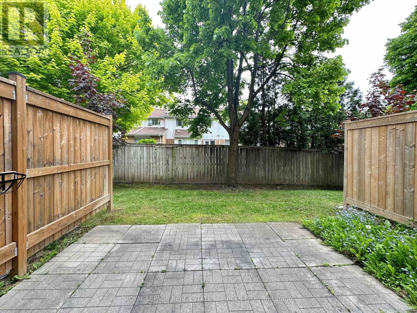 39 - 4600 Kimbermount Avenue, Mississauga, ON - Outdoor With Backyard