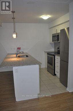 102 - 32 Fieldway Road, Toronto, ON - Indoor Photo Showing Kitchen