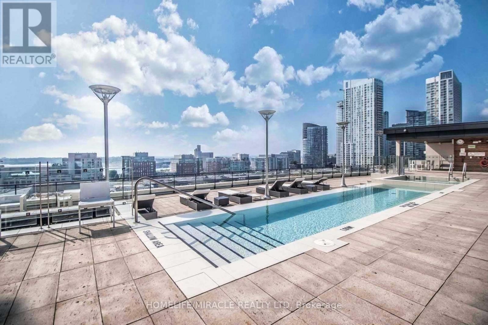 707 - 8 Telegram Mews, Toronto, ON - Outdoor With In Ground Pool With View