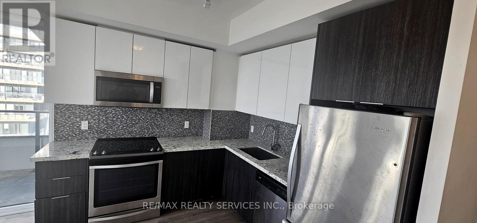 1402 - 20 Shore Breeze Drive, Toronto, ON - Indoor Photo Showing Kitchen With Upgraded Kitchen