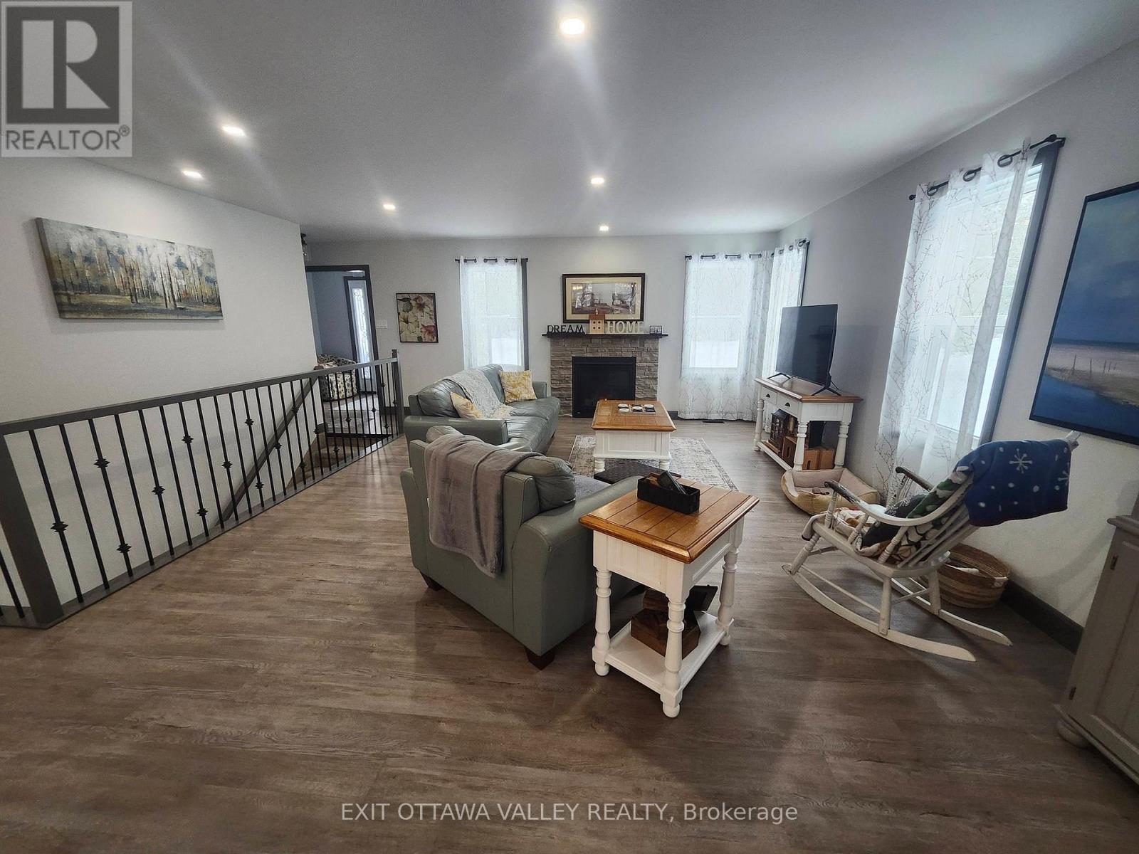 1485 Rapid Road, Whitewater Region, ON - Indoor Photo Showing Living Room With Fireplace