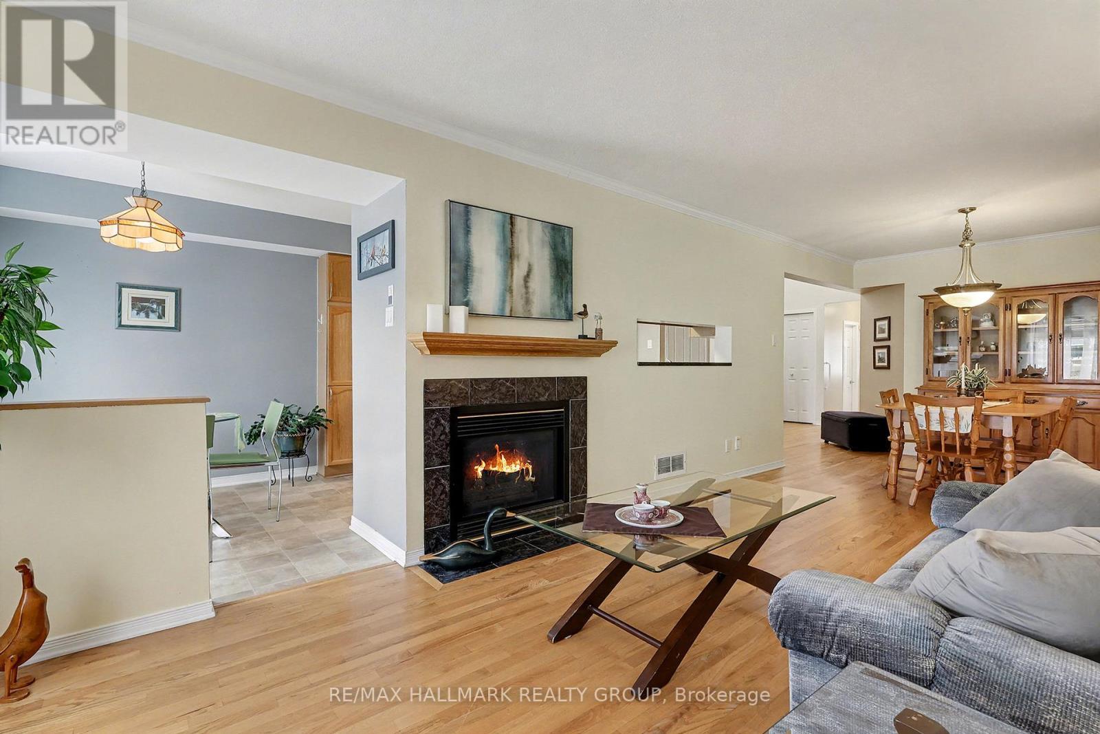 1690 Jobin Crescent, Ottawa, ON - Indoor Photo Showing Living Room With Fireplace