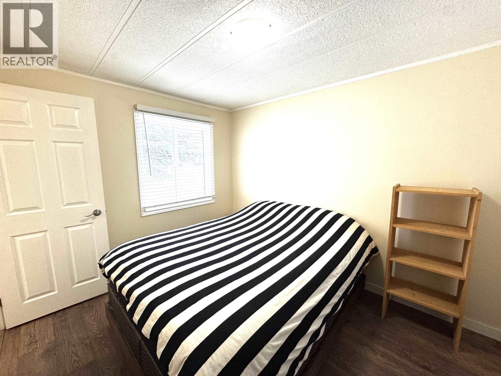 119 8420 Alaska Road, Fort St. John, BC - Indoor Photo Showing Bedroom