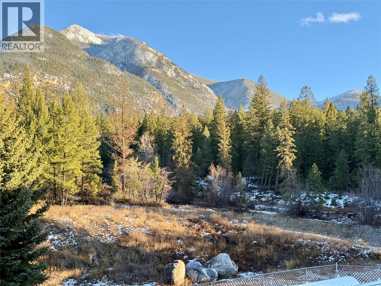 views from deck facing creek - 5201 Fairway Drive Unit# 704, Fairmont Hot Springs, BC - Outdoor With View