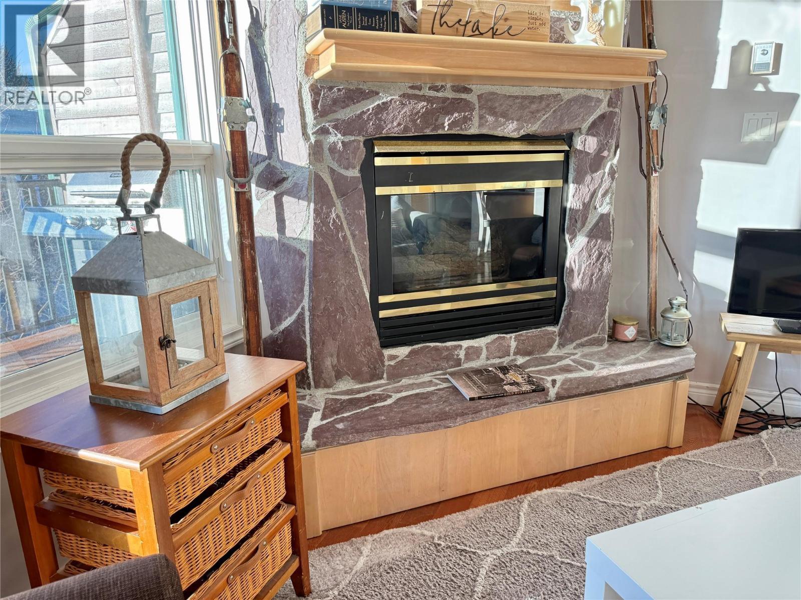 5201 Fairway Drive Unit# 704, Fairmont Hot Springs, BC - Indoor With Fireplace