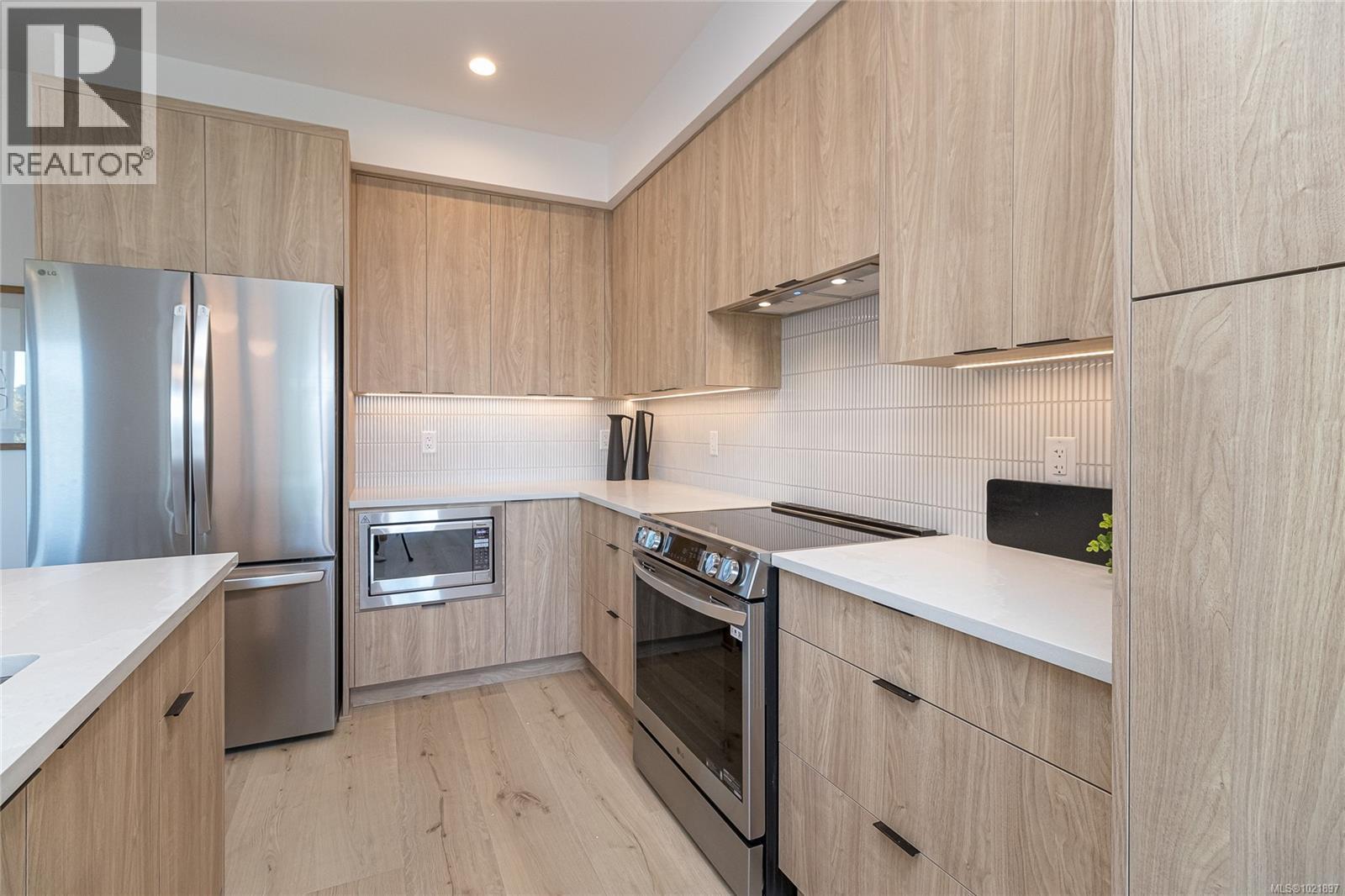 Photo not of this exact home, but one of similar construction. - 1426 Dolomite Ridge, Langford, BC - Indoor Photo Showing Kitchen With Stainless Steel Kitchen With Upgraded Kitchen