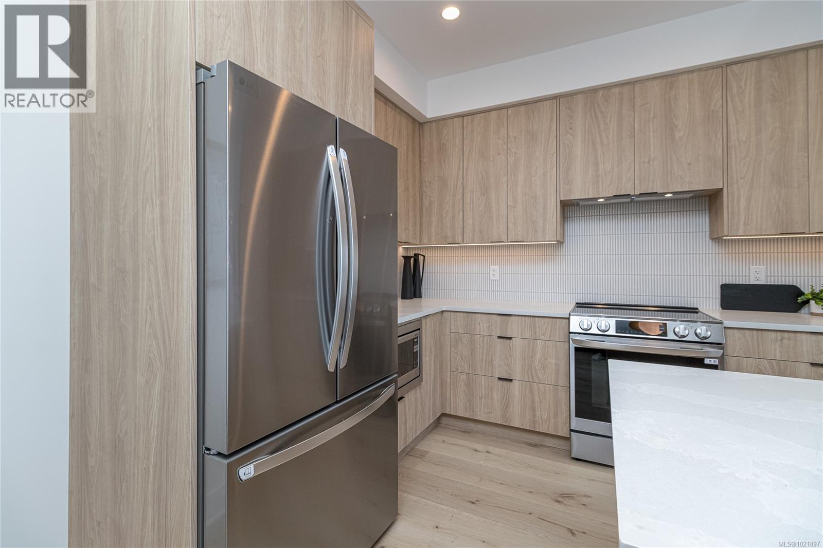 Photo not of this exact home, but one of similar construction. - 1426 Dolomite Ridge, Langford, BC - Indoor Photo Showing Kitchen With Stainless Steel Kitchen