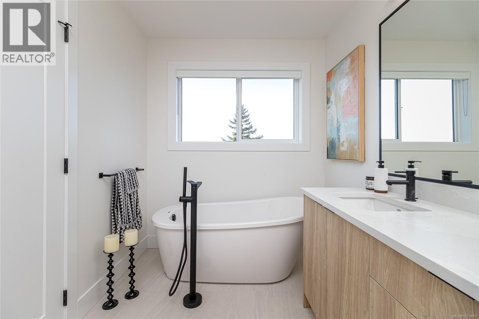 Photo not of this exact home, but one of similar construction. - 1426 Dolomite Ridge, Langford, BC - Indoor Photo Showing Bathroom