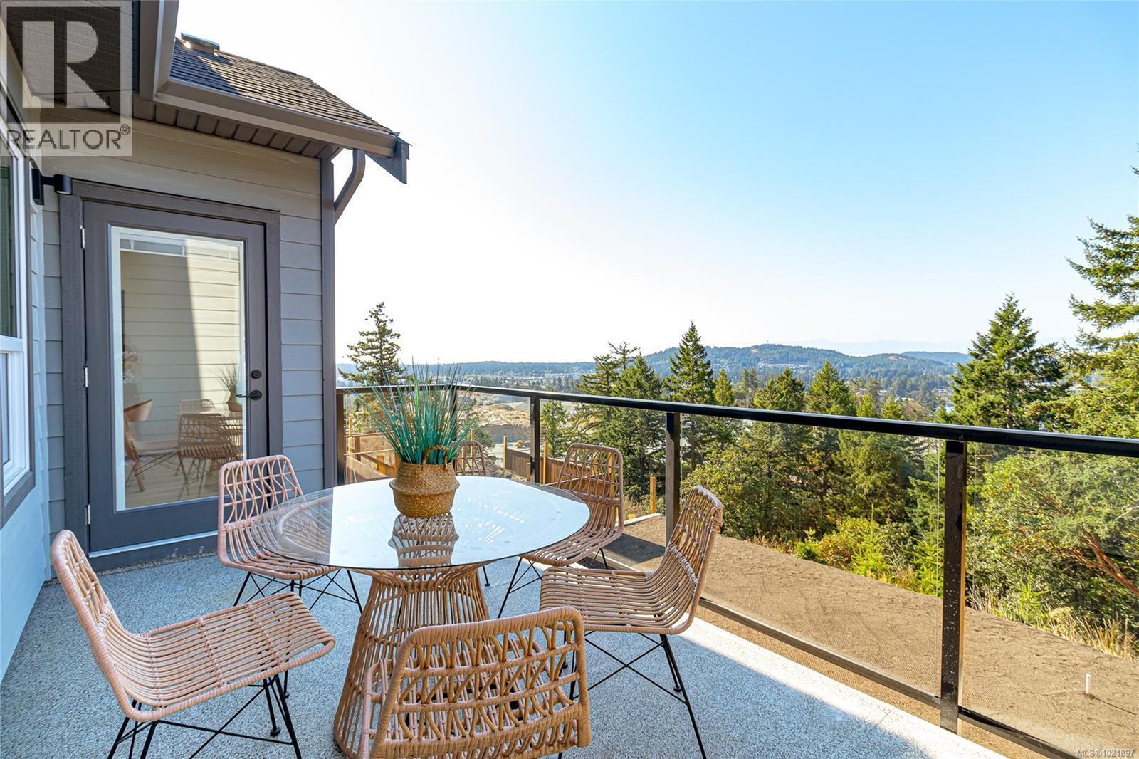 Photo not of this exact home, but one of similar construction. - 1426 Dolomite Ridge, Langford, BC - Outdoor With Deck Patio Veranda With View With Exterior