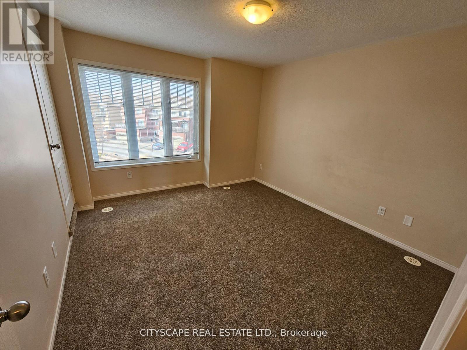 8 - 5605 Oscar Peterson Boulevard, Mississauga, ON - Indoor Photo Showing Other Room