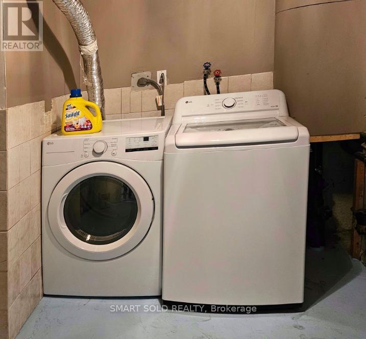#Lower Level - 2417 Whaley Drive, Mississauga, ON - Indoor Photo Showing Laundry Room