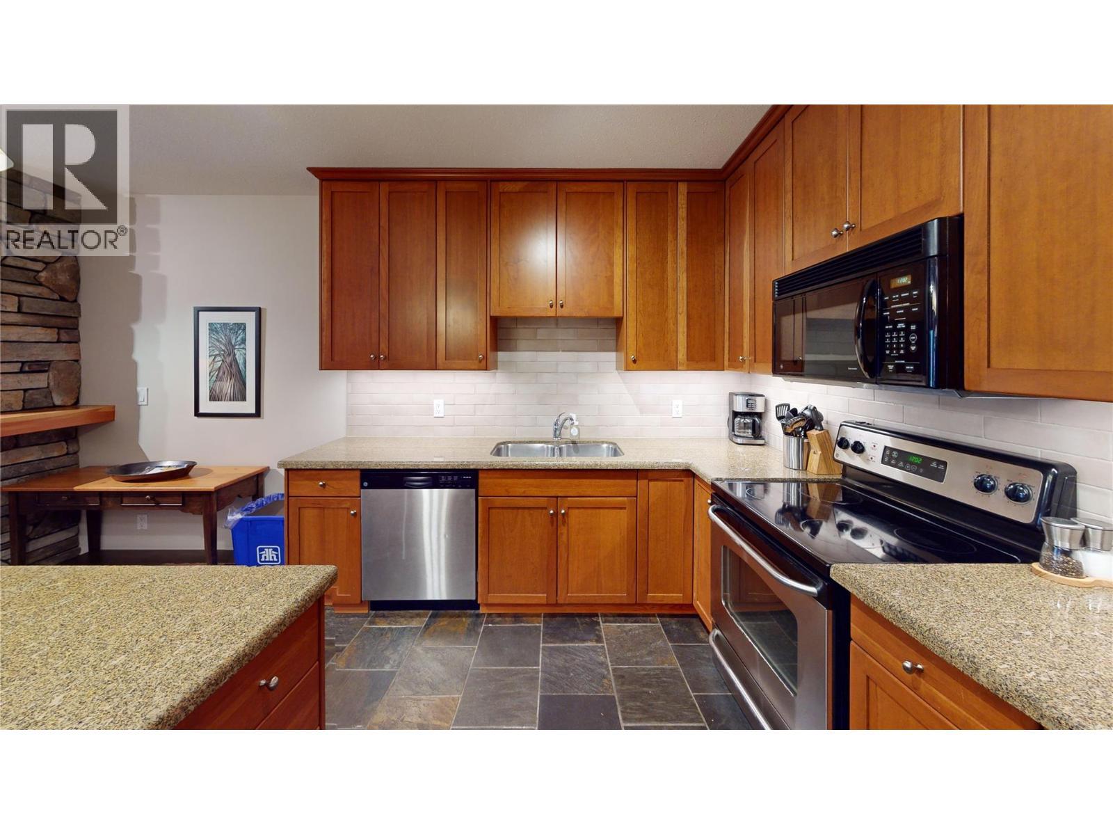 45 Rivermount Place Unit# 102D, Fernie, BC - Indoor Photo Showing Kitchen With Stainless Steel Kitchen With Double Sink