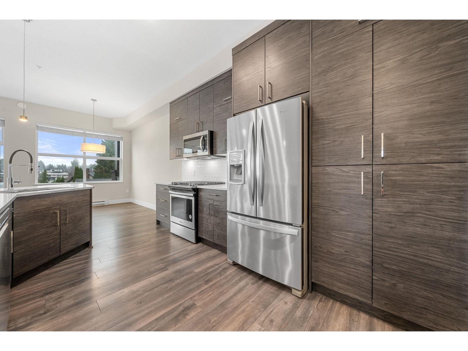 312 2120 Gladwin Road, Abbotsford, BC - Indoor Photo Showing Kitchen With Stainless Steel Kitchen With Upgraded Kitchen