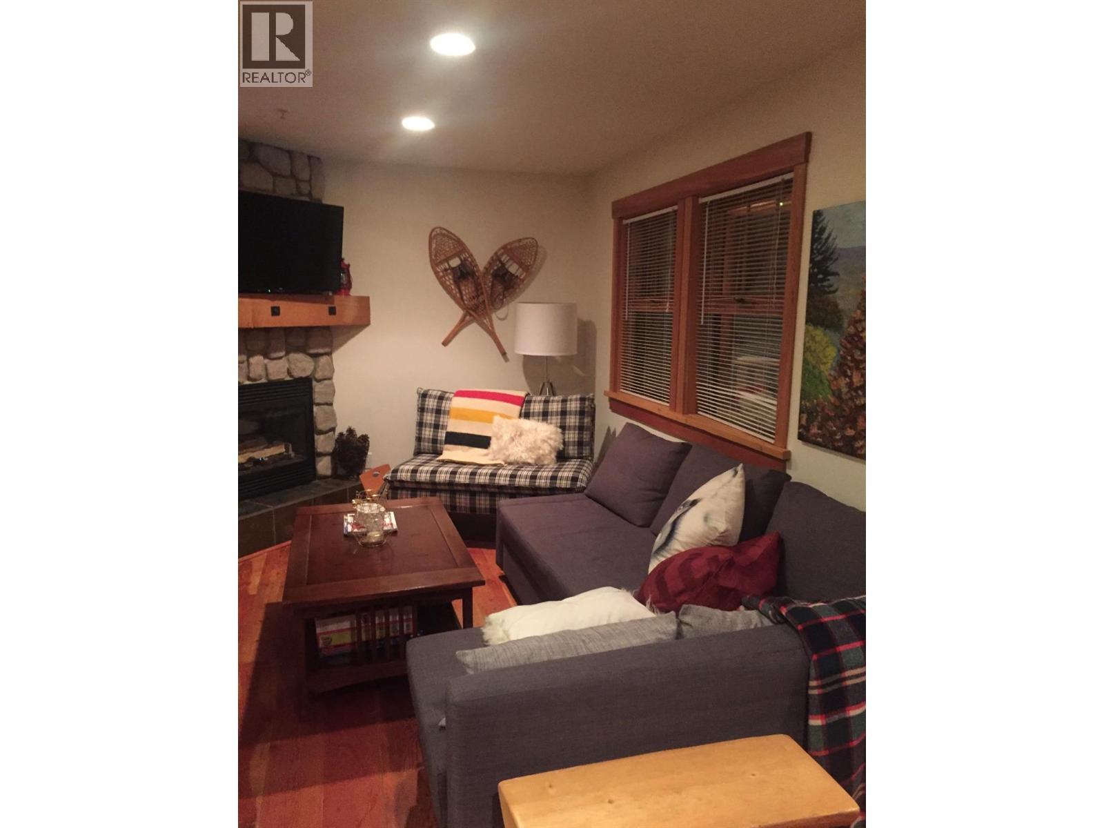 4809 C Snow Pines Road, Big White, BC - Indoor With Fireplace