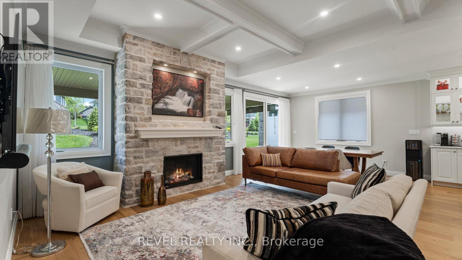 52 Beechnut Lane, Norfolk, ON - Indoor Photo Showing Living Room With Fireplace