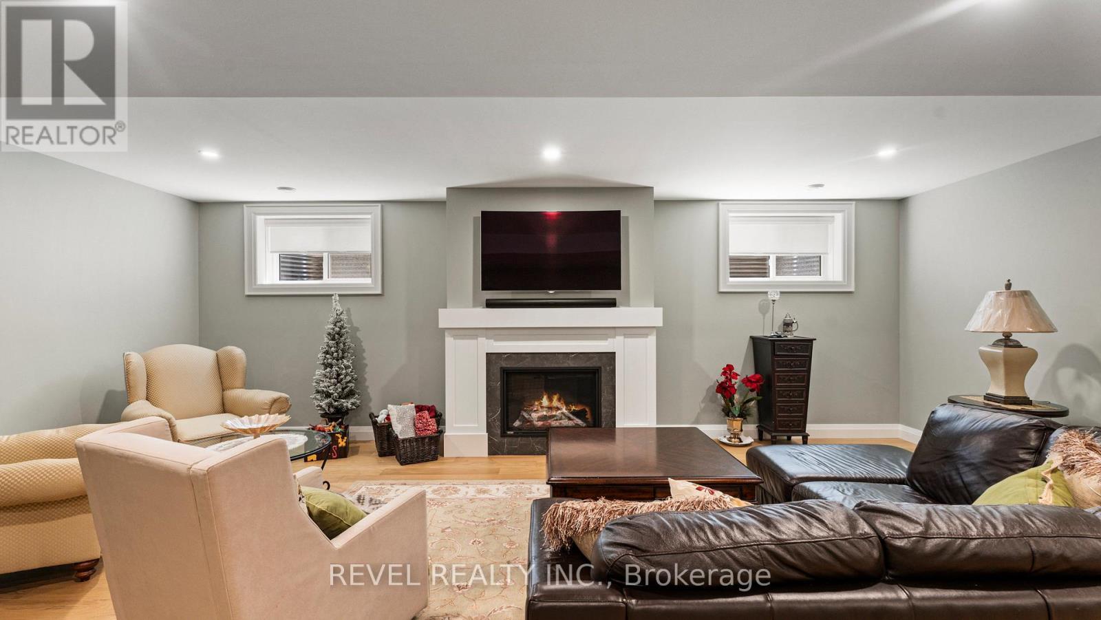 52 Beechnut Lane, Norfolk, ON - Indoor Photo Showing Living Room With Fireplace