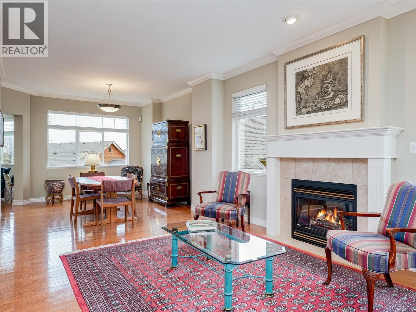 25 1286 Tolmie Ave, Saanich, BC - Indoor Photo Showing Living Room With Fireplace