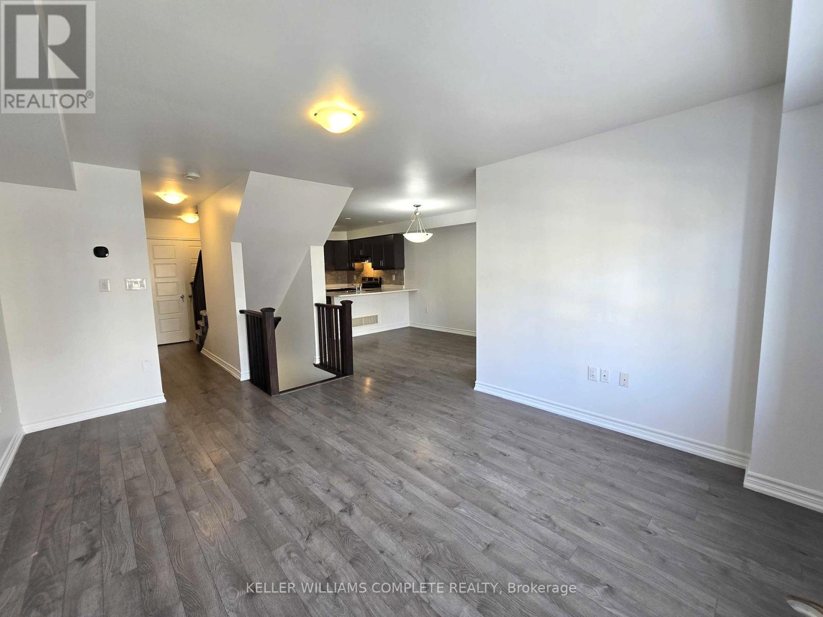 living room looking toward kitchen - 518 Buckeye Court, Milton, ON - Indoor