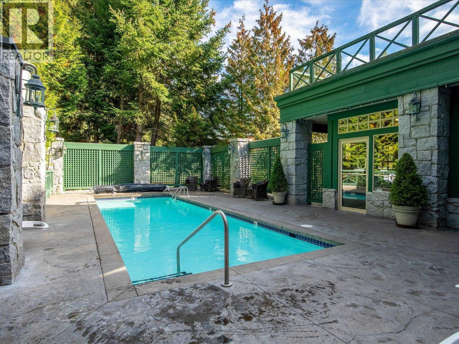 215 4319 Main Street, Whistler, BC - Outdoor With In Ground Pool