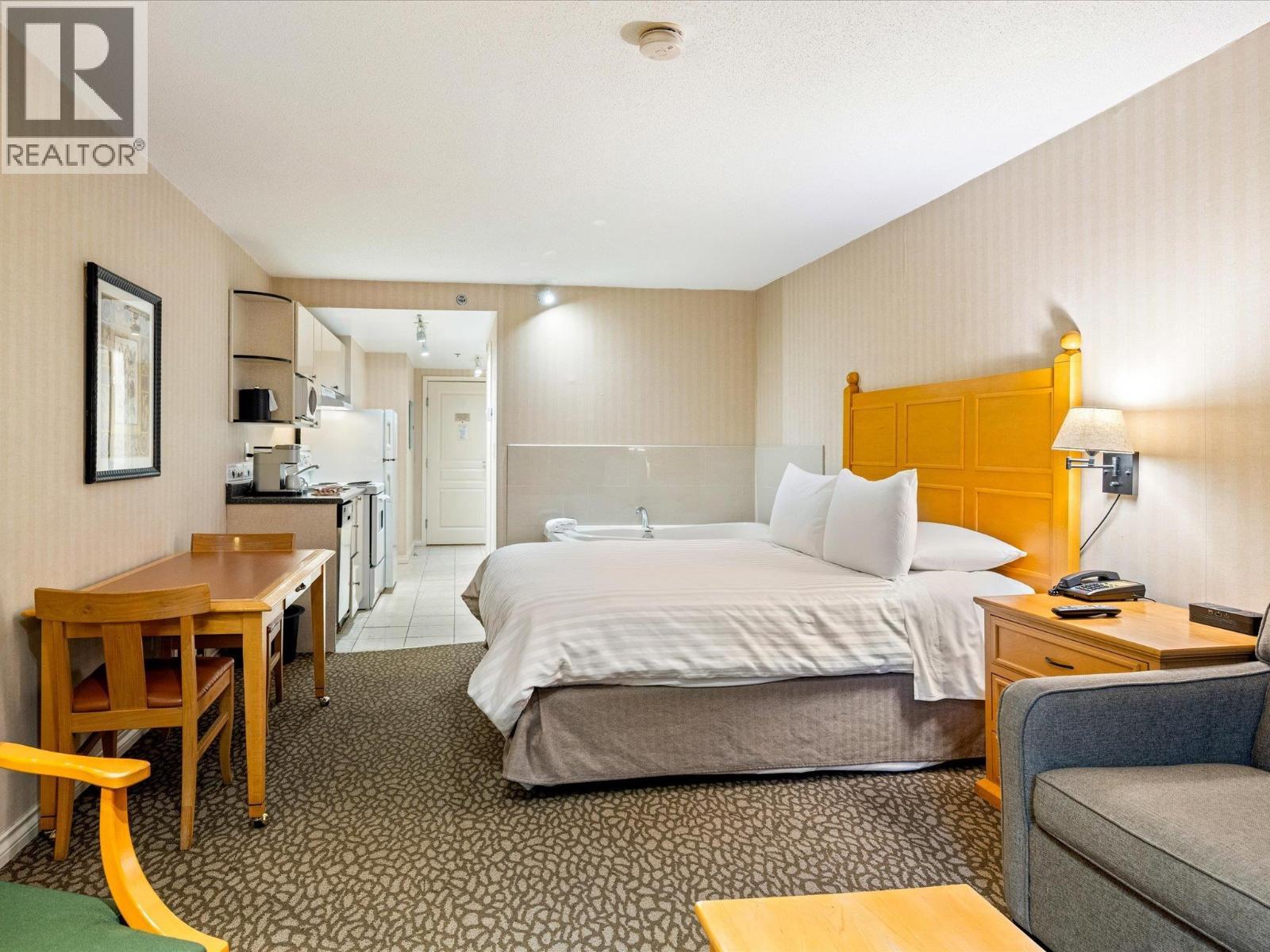 215 4319 Main Street, Whistler, BC - Indoor Photo Showing Bedroom