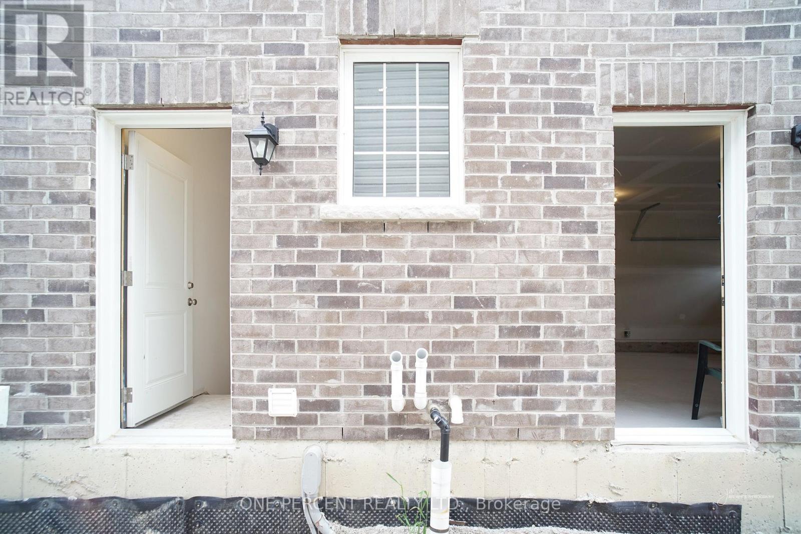 Entrance From Outside For Garage And Basement - 242 Springfield Crescent, Clearview (Stayner), ON - Outdoor With Exterior