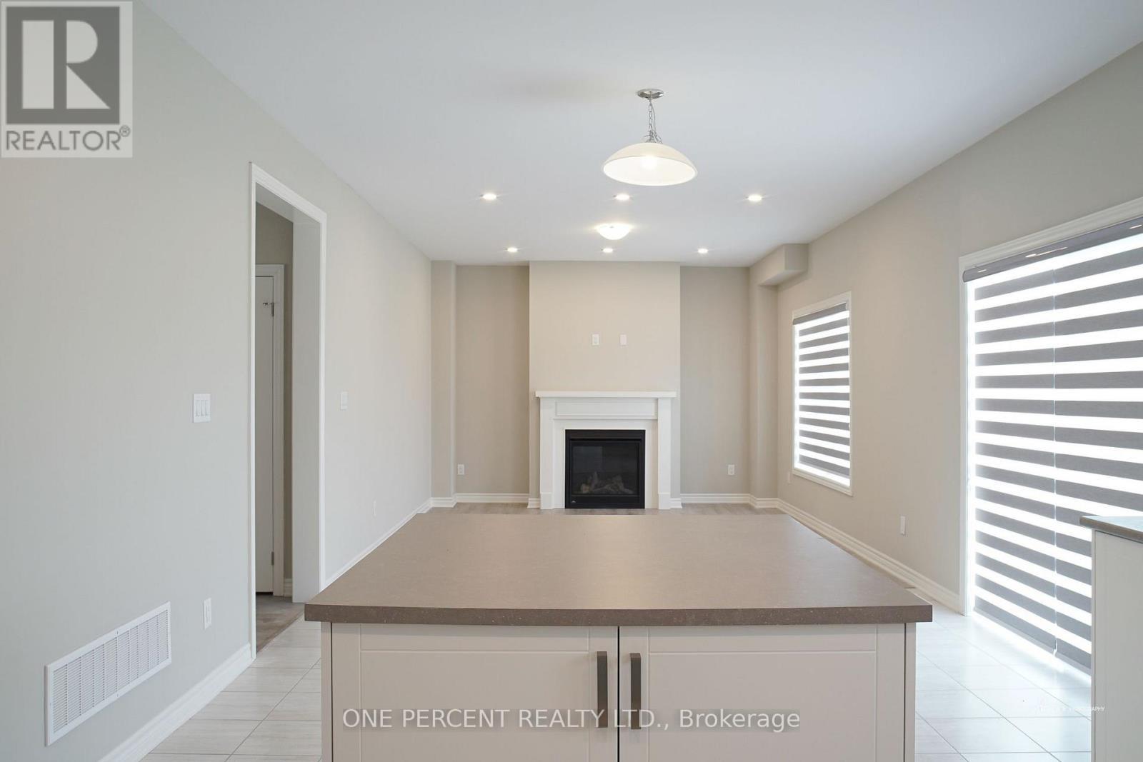 Family Room - 242 Springfield Crescent, Clearview (Stayner), ON - Indoor With Fireplace