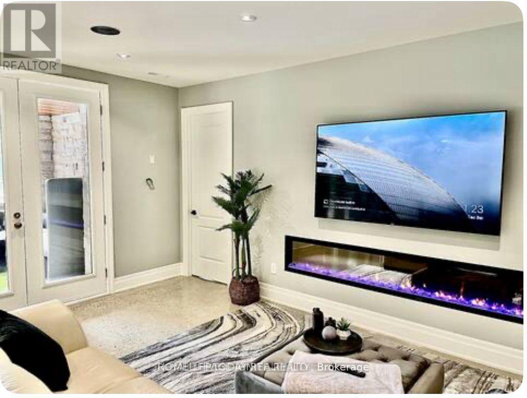 Bsmt - 63 Sylvan Avenue, Toronto, ON - Indoor With Fireplace