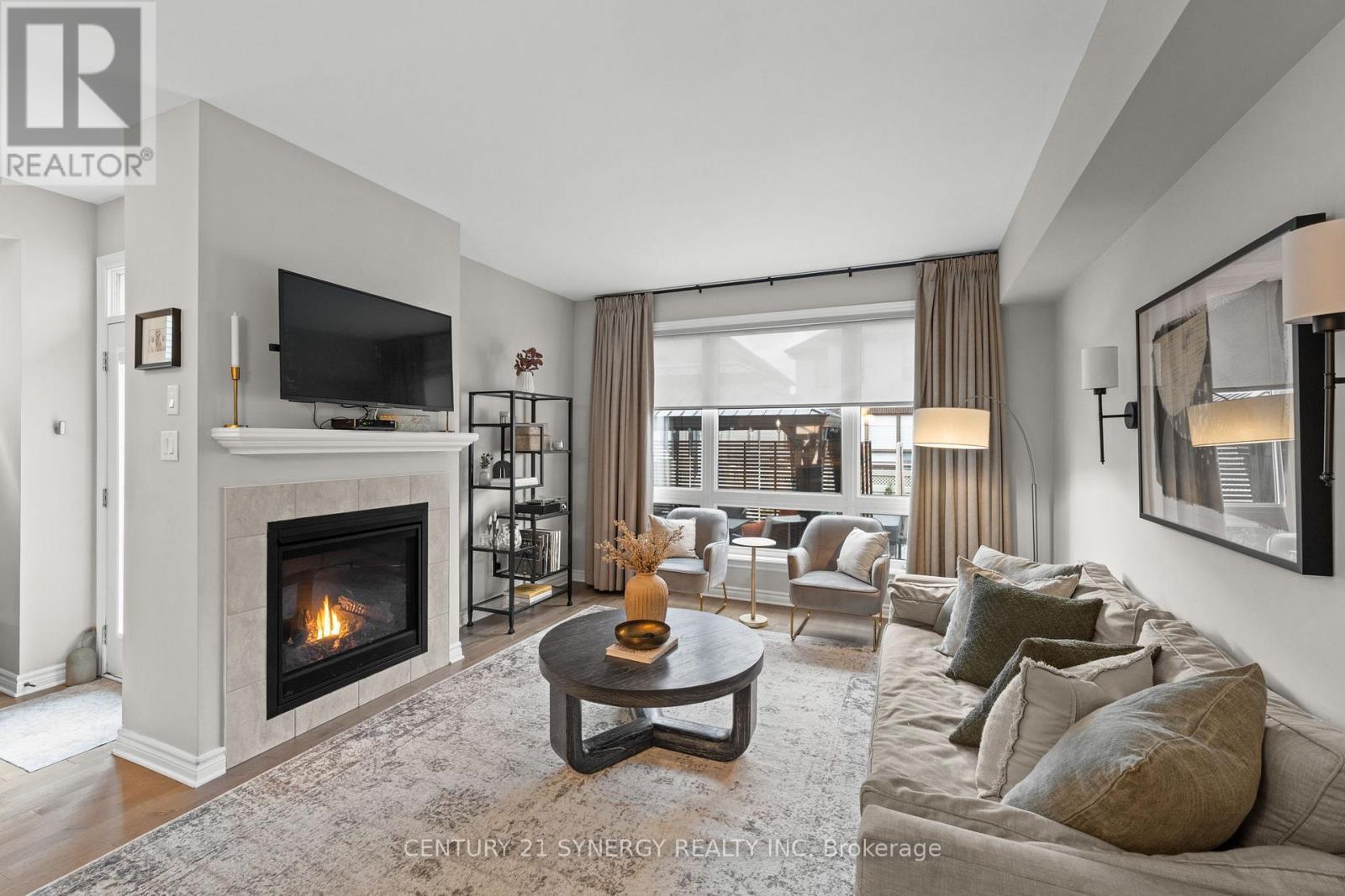 708 Guardian Grove, Ottawa, ON - Indoor Photo Showing Living Room With Fireplace
