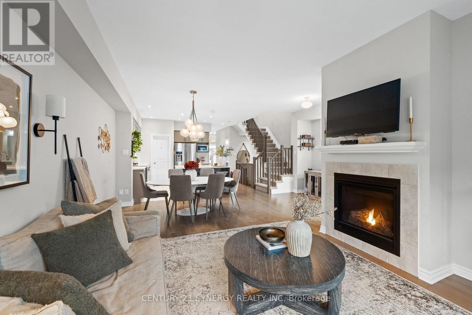 708 Guardian Grove, Ottawa, ON - Indoor Photo Showing Living Room With Fireplace