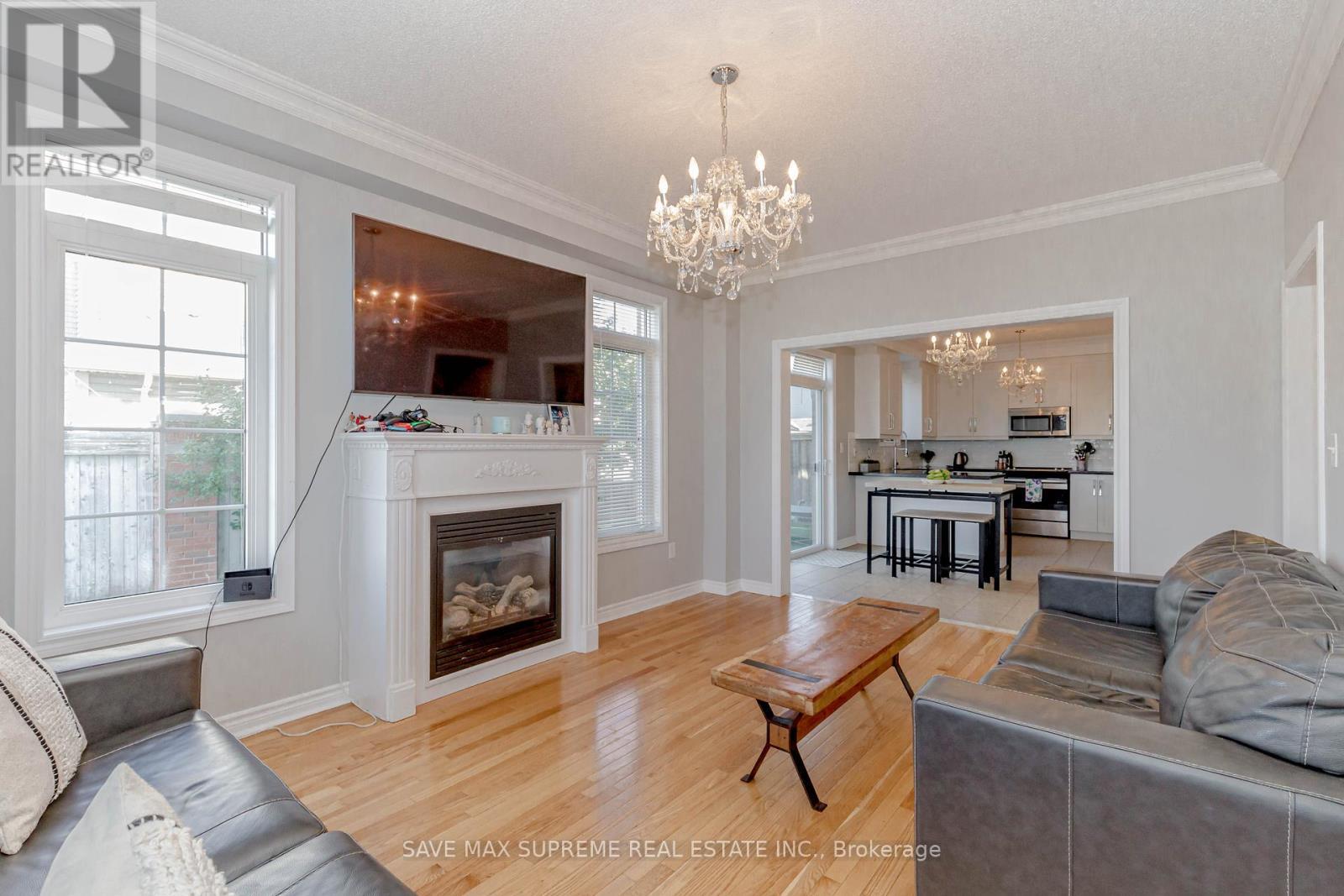 135 Prince William Way, Barrie, ON - Indoor Photo Showing Living Room With Fireplace