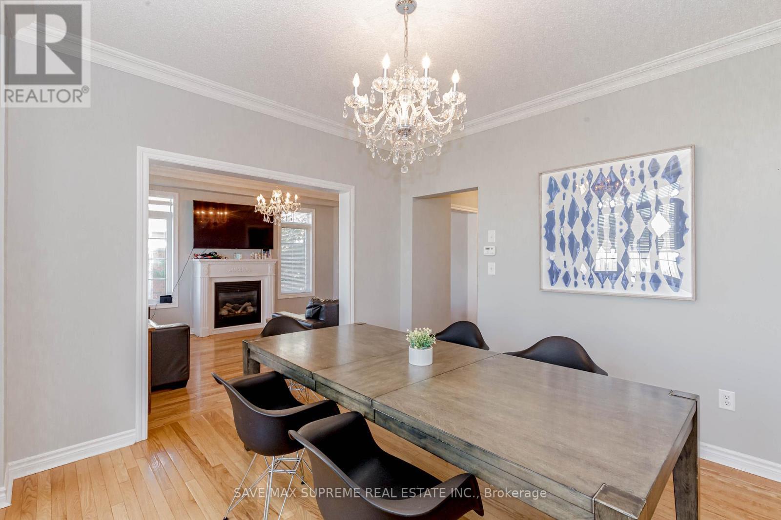 135 Prince William Way, Barrie, ON - Indoor Photo Showing Dining Room With Fireplace